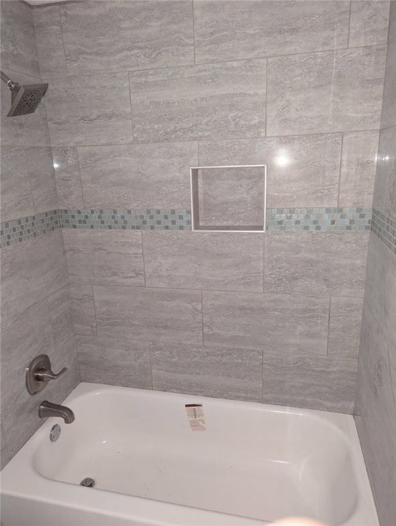 full bath featuring washtub / shower combination