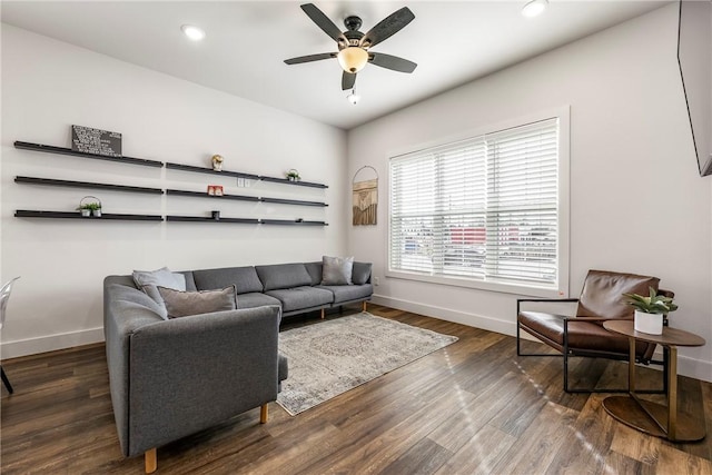 living room featuring recessed lighting, a ceiling fan, dark wood-style flooring, and baseboards