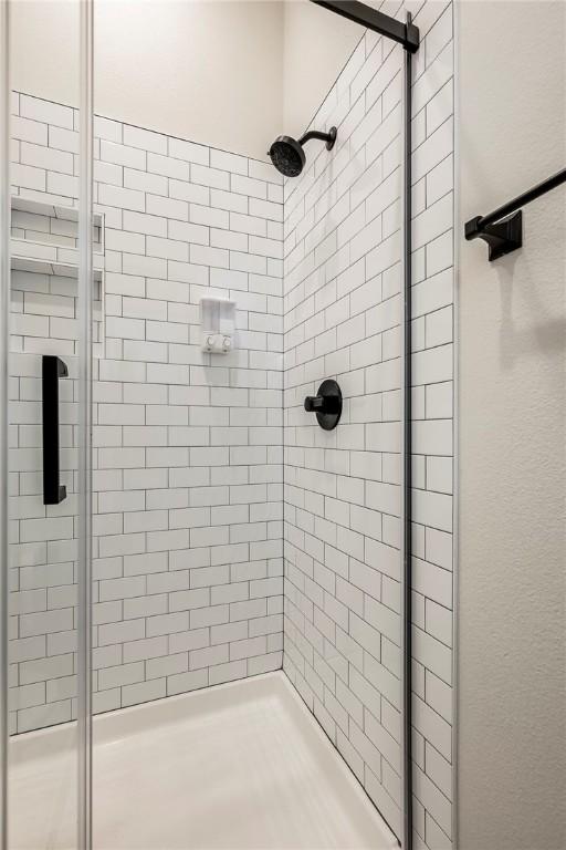 bathroom with a stall shower