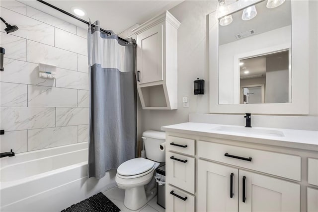 bathroom featuring visible vents, toilet, vanity, and shower / bath combination with curtain