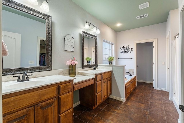 full bathroom featuring double vanity, visible vents, and a sink