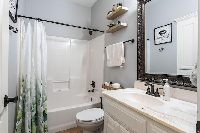 full bath with vanity, toilet, and shower / bath combo