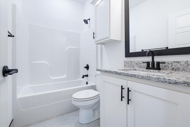 full bathroom featuring vanity, toilet, and shower / washtub combination