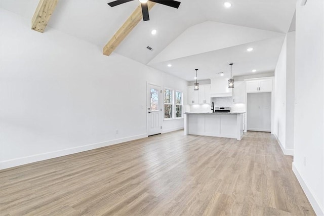 unfurnished living room with visible vents, baseboards, recessed lighting, ceiling fan, and light wood-style floors