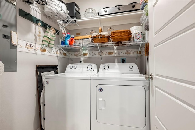 laundry area featuring washer and dryer and laundry area