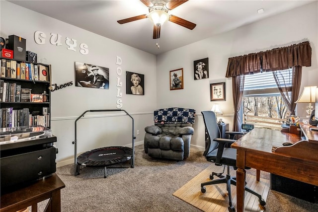 home office with carpet, baseboards, and ceiling fan