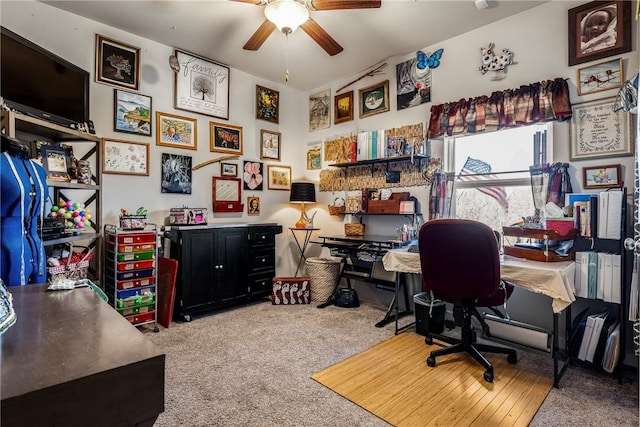 office with ceiling fan and carpet floors