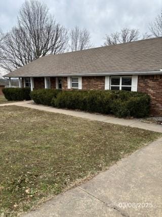 view of front facade with brick siding