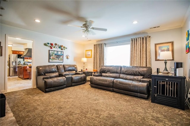 living room featuring recessed lighting, light colored carpet, crown molding, and a ceiling fan