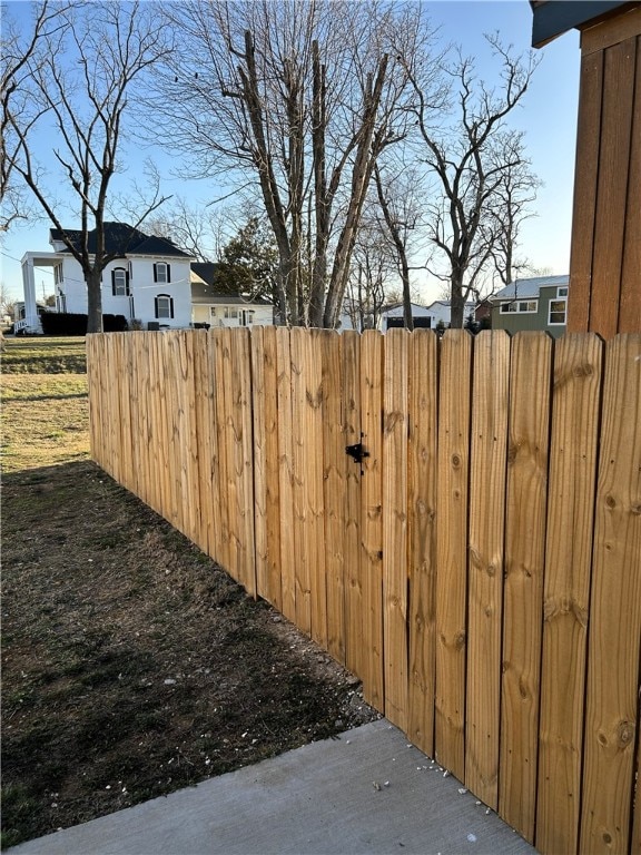 view of yard featuring a gate and fence