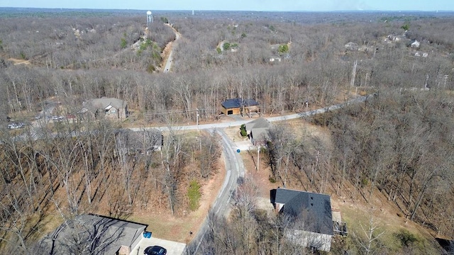 aerial view featuring a view of trees