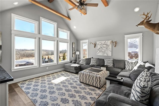 living room featuring wood finished floors, baseboards, high vaulted ceiling, recessed lighting, and ceiling fan