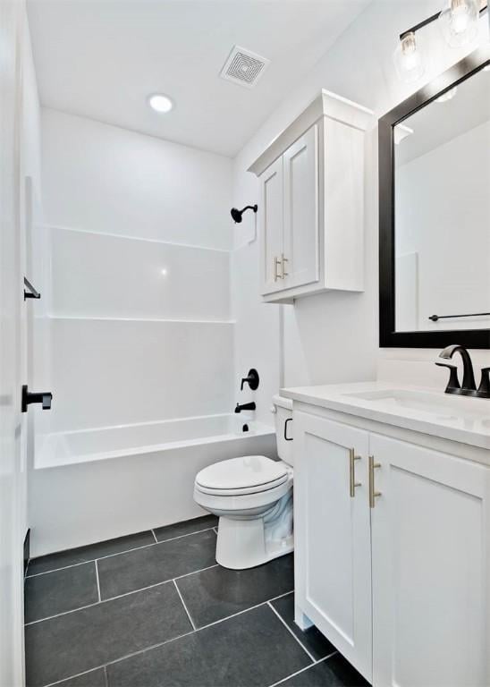 full bath featuring vanity, visible vents, tile patterned flooring, bathing tub / shower combination, and toilet