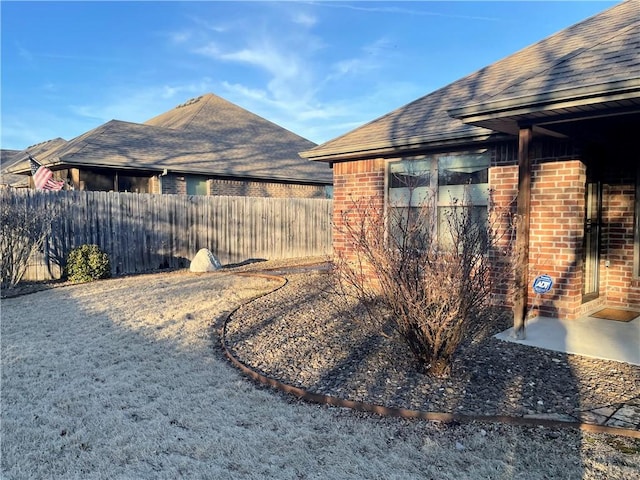 view of yard featuring fence