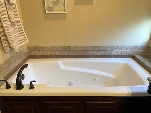 bathroom with a jetted tub