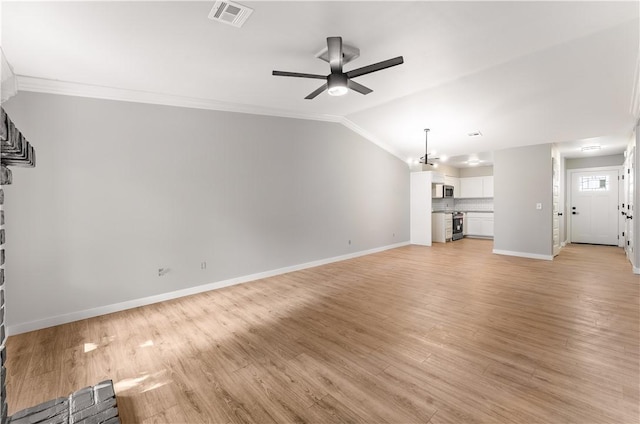 unfurnished living room with visible vents, light wood-type flooring, ceiling fan, and vaulted ceiling