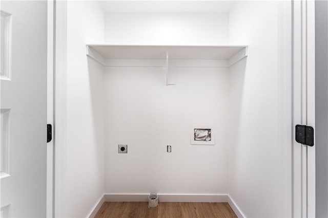 laundry area featuring baseboards, hookup for an electric dryer, hookup for a washing machine, and light wood finished floors