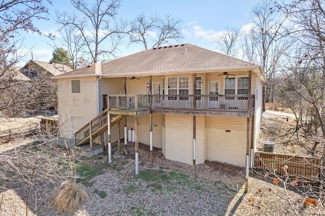 back of property featuring a wooden deck, a shingled roof, stairs, and ceiling fan