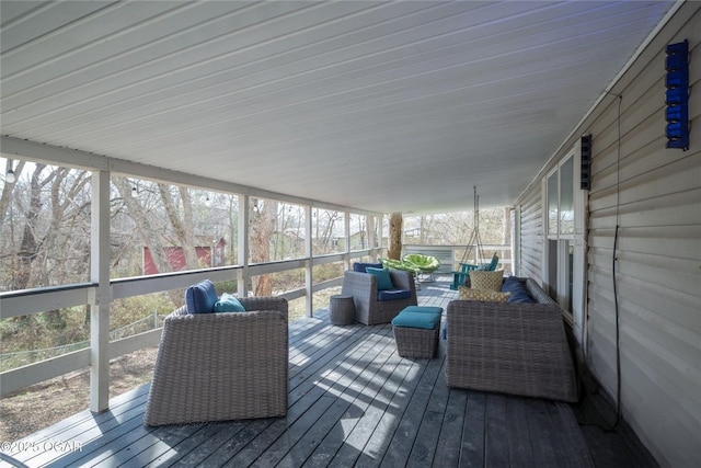 sunroom / solarium featuring plenty of natural light