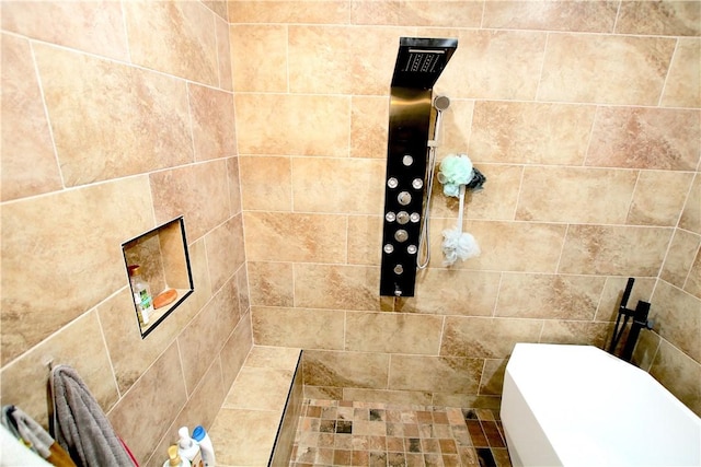 bathroom with a tile shower