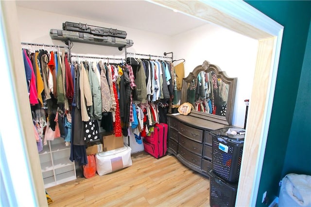 spacious closet with wood finished floors