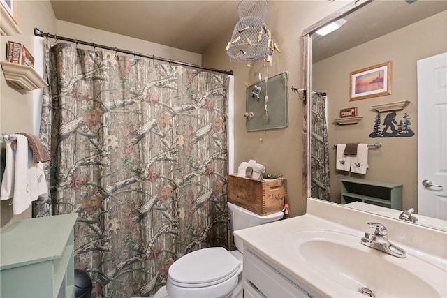 full bath with toilet and vanity