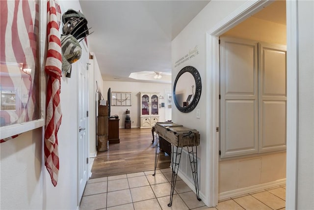 hallway with light tile patterned flooring