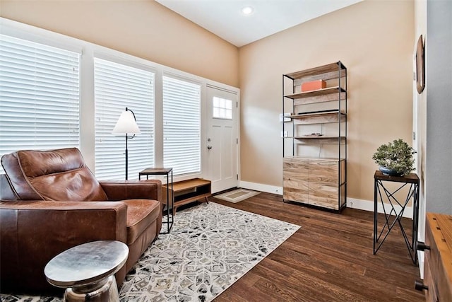 foyer entrance with dark wood-style floors, recessed lighting, and baseboards