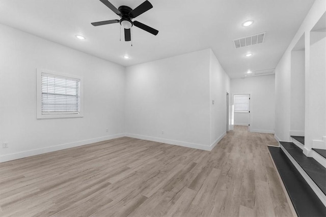 interior space featuring recessed lighting, light wood-style floors, visible vents, and baseboards