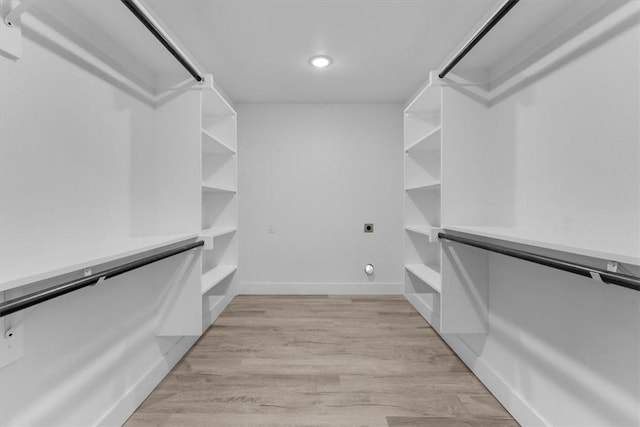 spacious closet with light wood-style floors