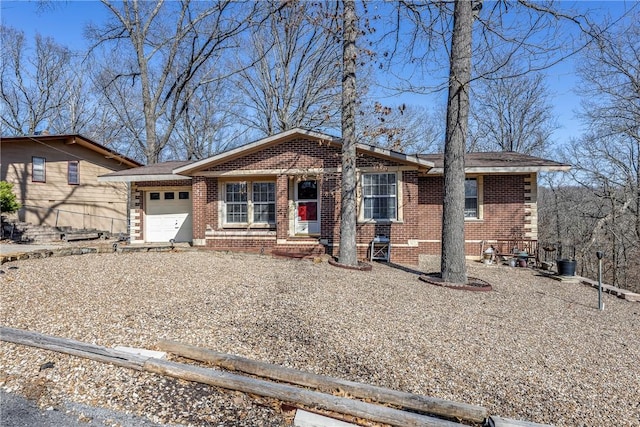 ranch-style house with brick siding and an attached garage