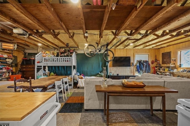 living room featuring wood walls