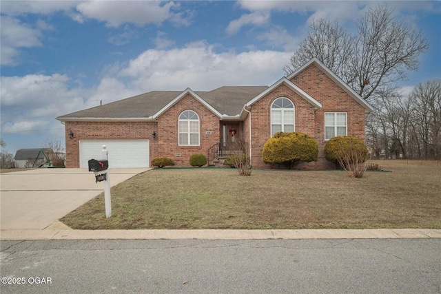 ranch-style house with a front yard, a garage, brick siding, and driveway