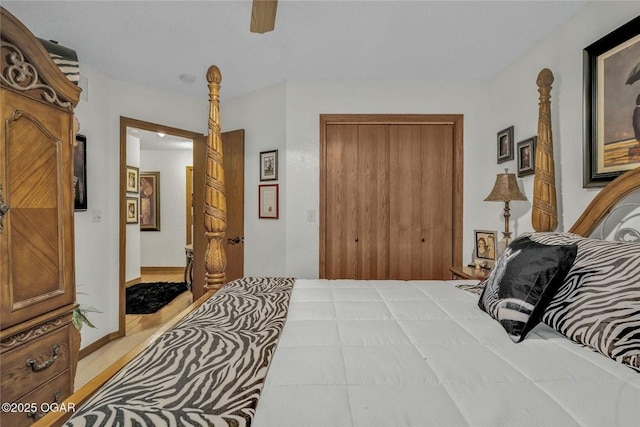 bedroom featuring a closet and a ceiling fan