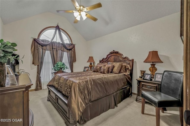 bedroom with light carpet, lofted ceiling, and a ceiling fan