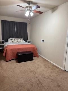 bedroom with a ceiling fan, carpet, and baseboards