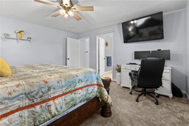 bedroom featuring ceiling fan, baseboards, and light carpet