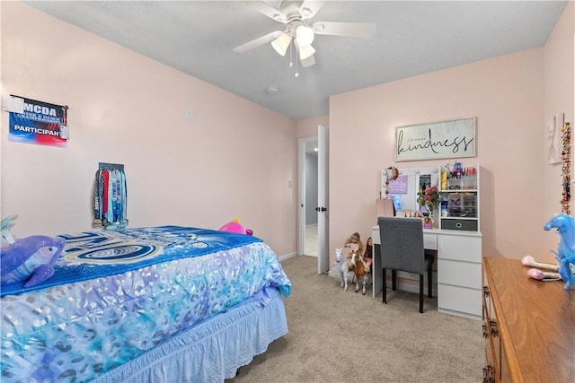 bedroom featuring ceiling fan and light carpet