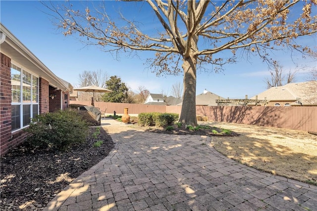 view of patio featuring a fenced backyard