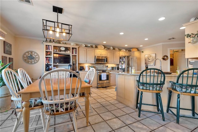 dining area featuring visible vents, ornamental molding, recessed lighting, an inviting chandelier, and light tile patterned floors