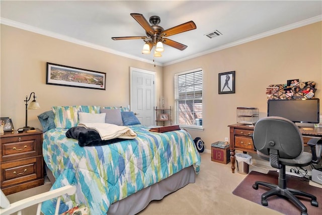 carpeted bedroom featuring baseboards, a ceiling fan, visible vents, and ornamental molding