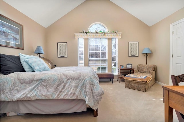 carpeted bedroom featuring baseboards, multiple windows, and lofted ceiling