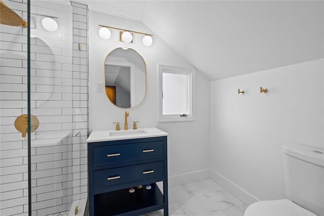 bathroom with toilet, marble finish floor, baseboards, tiled shower, and vaulted ceiling