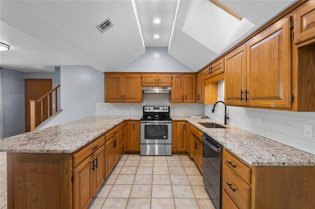 kitchen featuring visible vents, under cabinet range hood, dishwasher, stainless steel electric range oven, and a sink