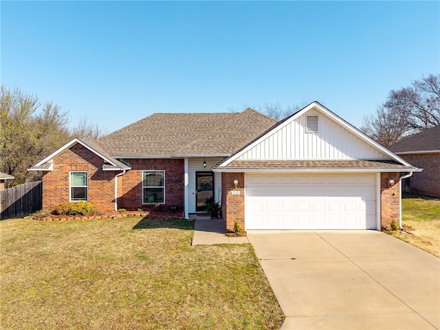 ranch-style home featuring brick siding, a garage, concrete driveway, and a front yard