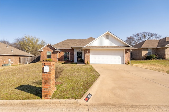 ranch-style house with brick siding, an attached garage, concrete driveway, and a front lawn