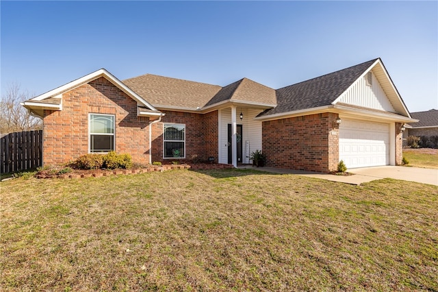 ranch-style house with fence, driveway, a front lawn, a garage, and brick siding