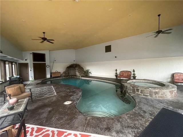 view of swimming pool with a pool with connected hot tub and a ceiling fan