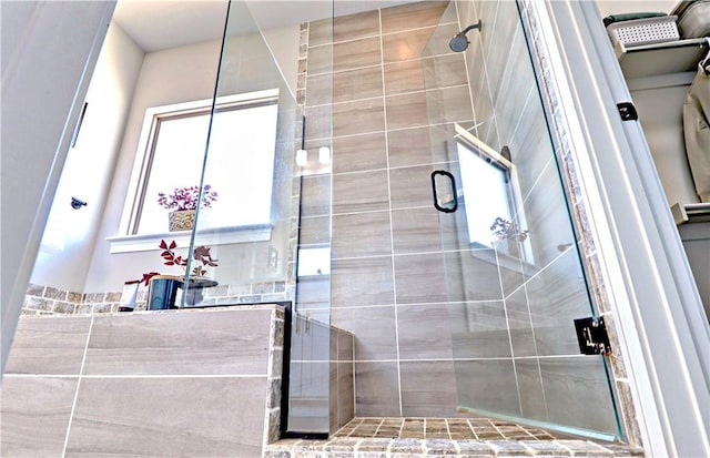 full bathroom featuring a stall shower