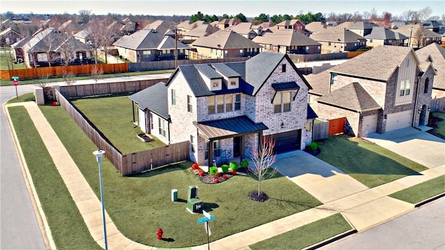 bird's eye view with a residential view